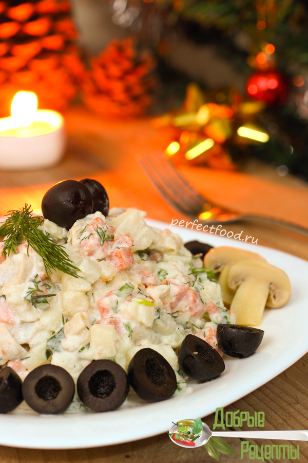 Traditional Russian salad on New Year night - vegetarian version with mushrooms
